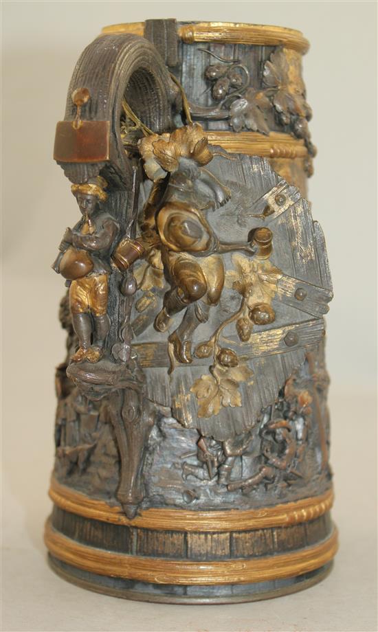 A late 19th century Dutch mixed metal tankard and oval tray, 9in.
